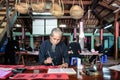 Man drawing calligraphy in Vietnam.