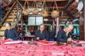 Men drawing calligraphy in Vietnam.