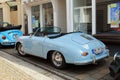 VW beetle and Porsche oldtimer car in Kettwig, district of Essen.