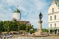 Historical square of city with view of medieval defensive fortress