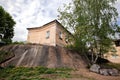 A house on a cliff is a residential building on the Progonnaya street, built on granite rock in the