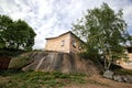 A house on a cliff is a residential building on the Progonnaya street, built on granite rock in the