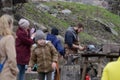 Vyborg, Russia, May 1, 2021-festival of medieval masters. A man dressed in the garb of medieval European blacksmith shows a master