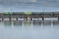 Vyborg, Russia-May 2, 2021: The freight train crosses the Northern Harbor via the railway Finland Bridge Royalty Free Stock Photo