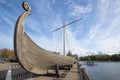 Viking longship close-up on a sunny September day. City embankment of Vyborg