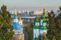 Vydubychi cathedral with view of Dnipro river and building of Kyiv. Ukraine. Royalty Free Stock Photo