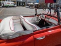 VYSOKE MYTO, CZECH REPUBLIC - Sept. 09. 2018. White leather interior of the historic cabrio Skoda Felicia. Historical red car Skod