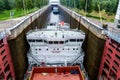 Vytegra, Russia - August 16, 2015: Two cargo ships entered the White Sea-Baltic Canal Gateway, White Sea, Karelia Royalty Free Stock Photo