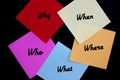 W questions on colored notes, black background 1 Royalty Free Stock Photo