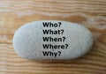 5 W questions on the stone - who?, what? when?, where?, why? - Royalty Free Stock Photo