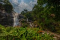 Wachirathan waterfall surrounded by lush tropical forest in Doi Inthanon National Park near Chiang Mai