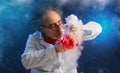 Wacky chemist with experiment Royalty Free Stock Photo