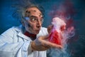 Wacky scientist with explosive experiment Royalty Free Stock Photo