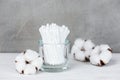 Wadded sticks and cotton flowers on the wooden table Royalty Free Stock Photo