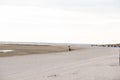 Wadden Sea.Walks and rest on the Wadden Sea.Beach wicker boxes set on white sand.Fer Island.North Sea. recreation and Royalty Free Stock Photo