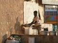 WADI - HALFA, SUDAN - NOVEMBER 19, 2008: Nubian woman washing di Royalty Free Stock Photo