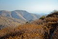 Wadi Kelt or Nahal Prat, in the Judean Desert, Israel. Early autumn in a nature reserve. The sky is in a haze Royalty Free Stock Photo