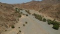 Aerial view from a drone flying over the north entrance of Wadi Massal, Saudi Arabia