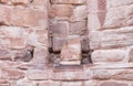 The remains of a bas-relief in a niche in the ruins of Roman Temple in Petra. Near Wadi Musa city in Jordan Royalty Free Stock Photo