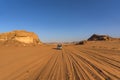 Wadi rum desert Jordan. in a beautiful landscape, bedouin people drive cars most tourists around to show the beauty of the desert,