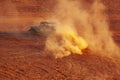 local tour guide is driving an off road desert safari pickup truck in circles on the red sands of Wadi Rum desert