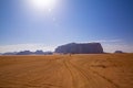Wadi Rum desert in Jordan. Red yellow sand dunes and rocky mountains Royalty Free Stock Photo