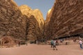 Wadi Rum desert Jorden 17-09-2017 a group of tourists go to the Bedouin tent, hidden among the high mountains in the middle of the
