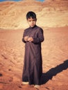 Wadi Rum, Jordan, February 16th 2023, Child wearing traditional clothes in Wadi Rum