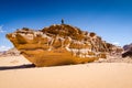 Wadi Rum, Jordan - January 26, 2016. Desert of Wadi Rum and man standing on sandstone in shape of boat