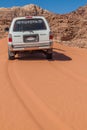 WADI RUM, JORDAN - MARCH 26, 2017: 4WD Toyota on a sand dune in Wadi Rum desert, Jord Royalty Free Stock Photo