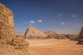 Wadi Rum Jordan Middle East desert scenery top view sand valley surrounded by dry rocky mountains picturesque landscape from above Royalty Free Stock Photo