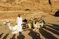 Local offering camel rides through the desert