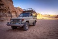 Wadi Rum, Jordan - Vintage Toyota Land Cruiser 4WD in a desert Royalty Free Stock Photo