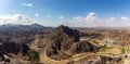 Wadi Shawka Dam panorama, with empty dam, dry riverbed and rocky Hajar Mountains, United Arab Emirates Royalty Free Stock Photo