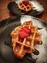 Waffel pastry with red strawberry topping