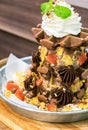 Waffle chocolate ice cream with topping fruits and whip cream Royalty Free Stock Photo