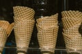 Waffle cone for ice cream in a glass case Royalty Free Stock Photo
