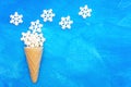 Snowflake shapes and a waffle cone Royalty Free Stock Photo