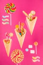 Waffle cones with different delicious jelly candies and lollipops Royalty Free Stock Photo