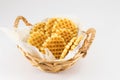 Waffle cookies in a wicker basket Royalty Free Stock Photo