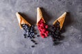 Waffle with fresh berries. Berries. Raspberries, blackberries, blueberries in waffle cones Royalty Free Stock Photo