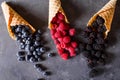 Waffle with fresh berries. Berries. Raspberries, blackberries, blueberries in waffle cones Royalty Free Stock Photo