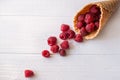 Waffle with fresh raspberrie on a wooden white background Royalty Free Stock Photo