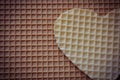 Waffle heart on waffle background