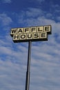 Waffle house sign on a beautiful day