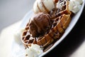 Waffle with ice cream cream and chocolate