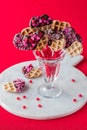 Waffle pops in a vase of cinnamon hearts, for Valentine's Day