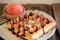 Waffle with scoop of strawberry sherbet ice cream Royalty Free Stock Photo