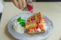 Waffle Strawberry with whipped cream for breakfast