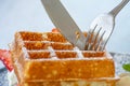 Waffle Strawerry fresh cream in the black plate on wooden table Royalty Free Stock Photo